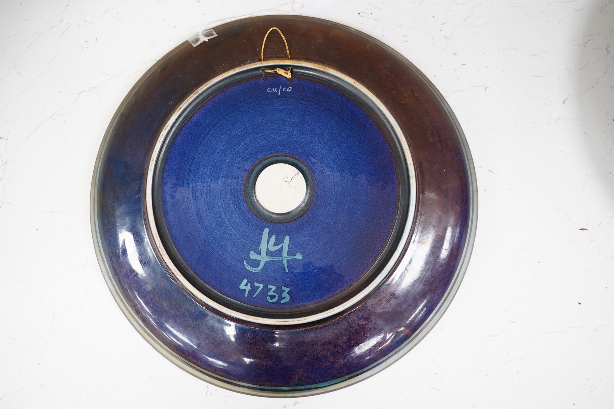 A Jonathan Chiswell Jones lustre 'Dodo' dish, 33.5cm diameter. Condition - good